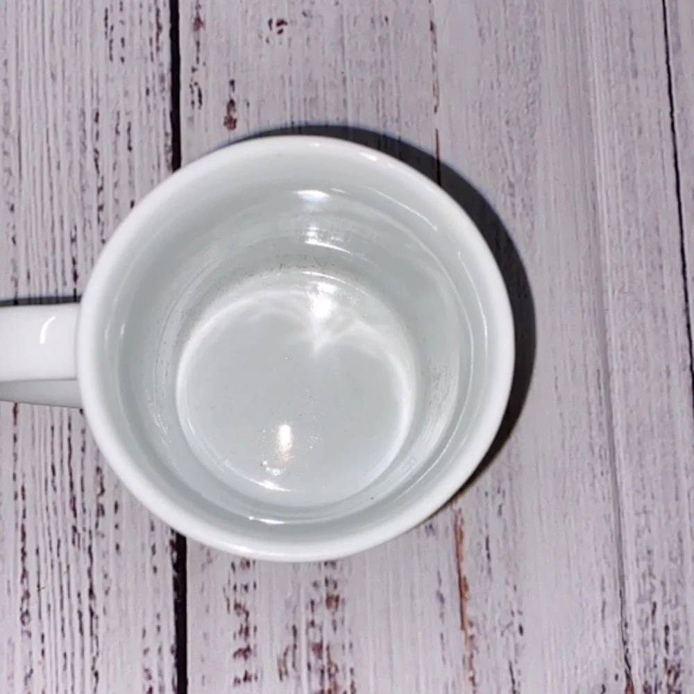 Vintage cabin in the snowy woods coffee mug
